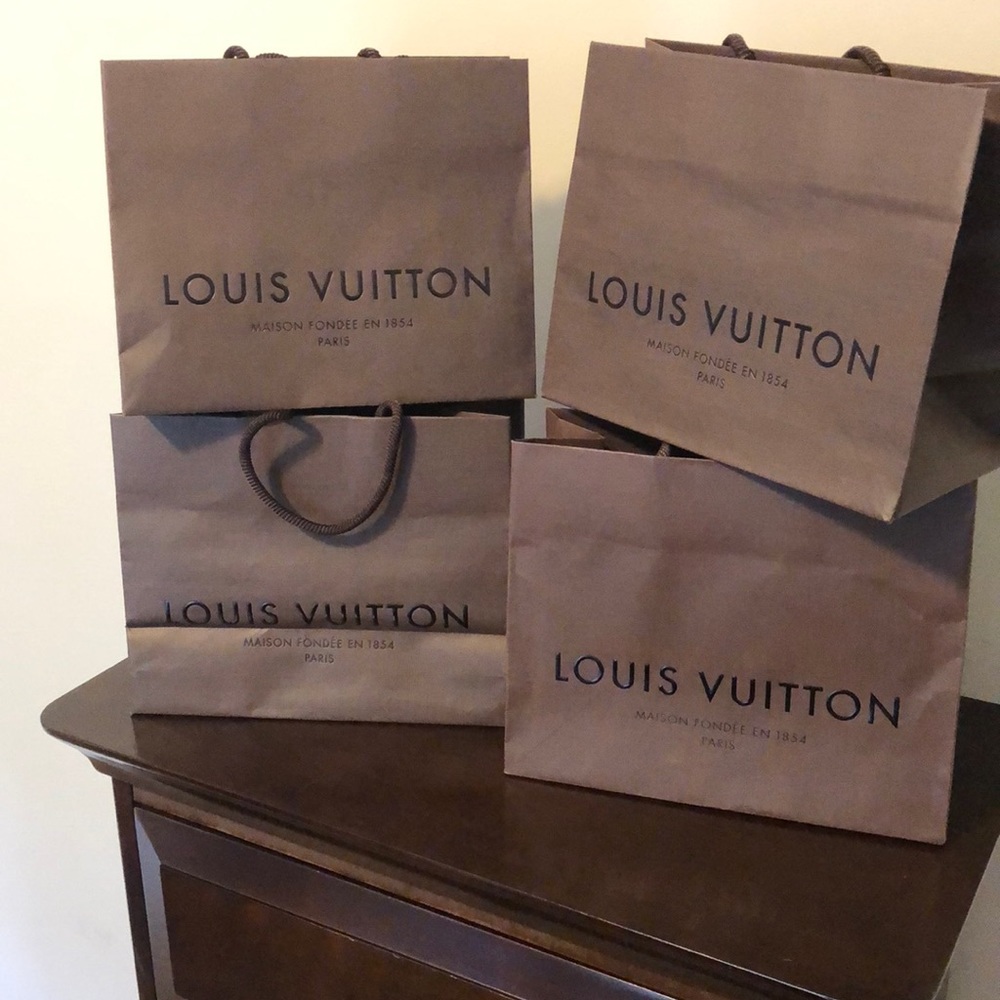 4 bags available . Louis Vuitton Shopping bags